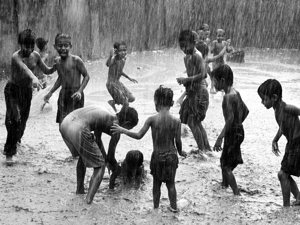 children-play-rain-india