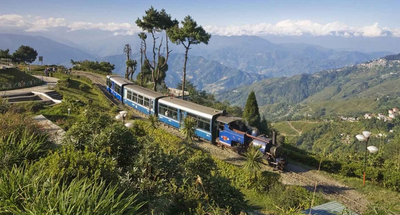 darjeeling toy train in india - mountain and garden view